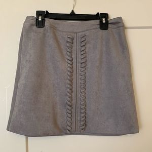 Grey suede skirt with braided detail. NEVER WORN
